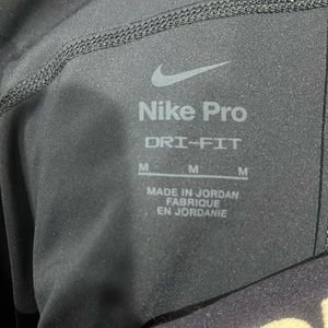 Nike pros size medium in a dark blue/navy blue